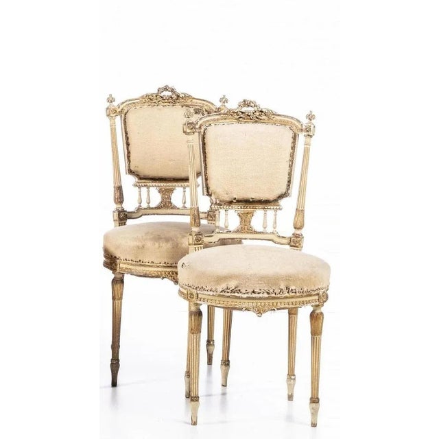 Set 5 French Chairs Louis XV Style 19th Century In painted and gilded carved wood. Upholstered seats and back. Faults and...