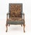 Louis XV Style Needlepoint Upholstered Walnut Arm Chair, the arms carved with floral motif and the cabriole legs ornately...