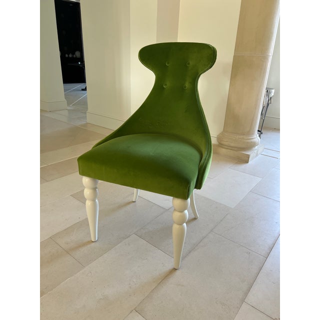 An exceptional and rare offering of twelve Julian Chichester Emma dining chairs, presented in immaculate, like-new...