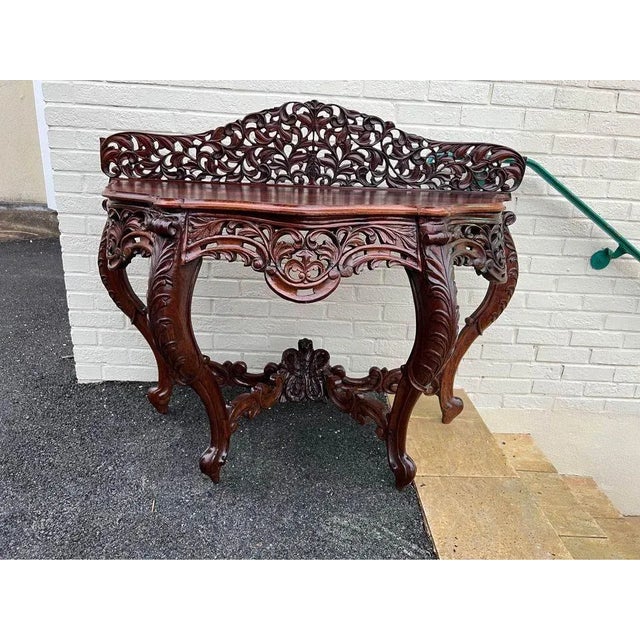 Vintage Southeast Asian Rococo Style Rosewood Console Table. Hand carved, Well made Approximate measurements: Overall...