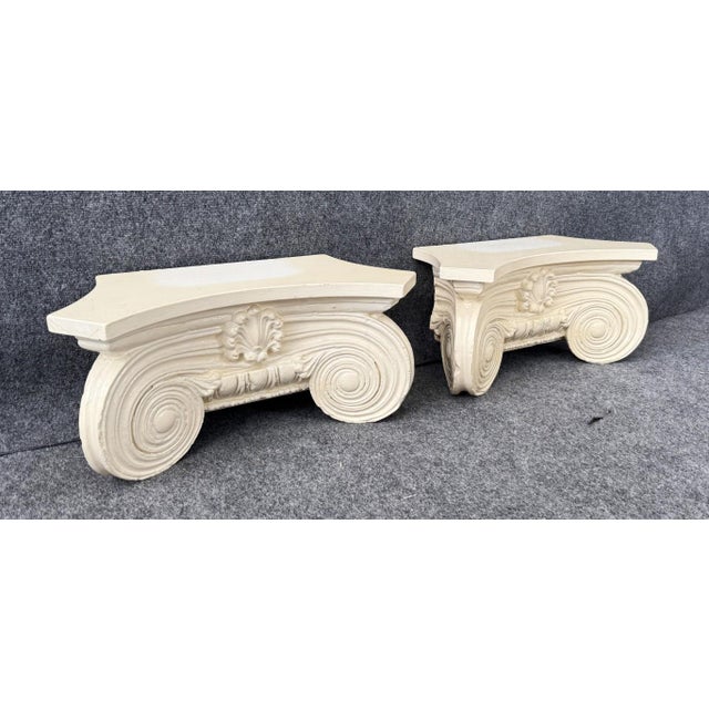 This Pair of Vintage Architectural Wall Sconces or Shelves features a classical Ionic column design with elegant volute...
