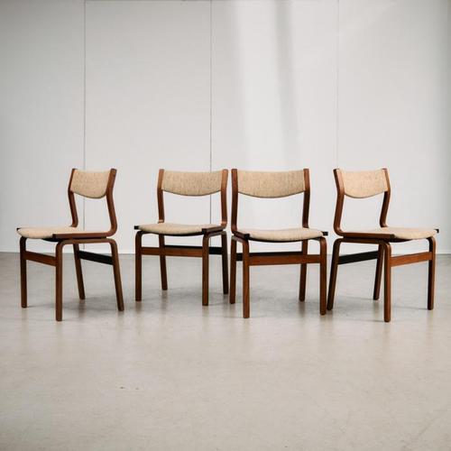 This mid-century chair set is built from moulded, stained beechwood, with curved lines that give the frames a clean, easy,...