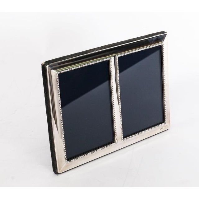 A truly superb large decorative double sterling silver photo frame with maker's mark RC for Carrs of Sheffield Ltd, and...