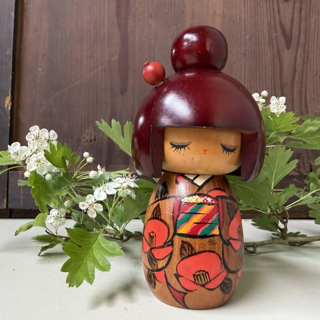 Small vintage sōsaku kokeshi titled “Mebae”, referring to sprouting or first growth, by Miyashita Hajime. The wooden doll...