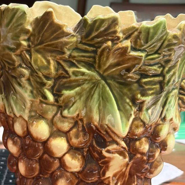Mid-Century McCoy grapes and leaves vase. This vase has drainage base holes. It was handmade in the USA in the 1950s. It...