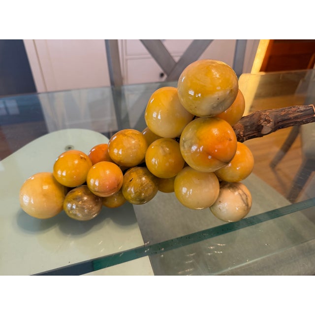 Mid century Italian grape decor. The grapes are made out of alabaster and the vine is a real grape vine from Italy.