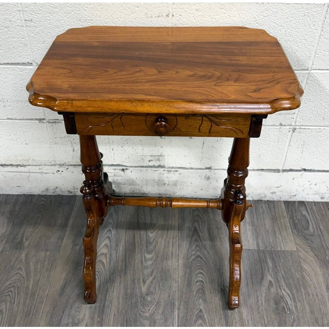 This is a gorgeous antique Victorian Eastlake Aesthetic Movement walnut side table or parlor table with carved drawer,...