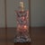 The Antique Hand Carved Hardwood Hotei Happy Joyous Buddha Arms Raised Table Lamp is a unique and decorative piece perfect...