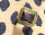 Blue Christina Addison Yellow Gold Bezel Set Ring With Iolite and Surrounding Green Garnet For Sale - Image 8 of 12
