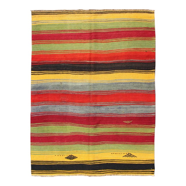 Colorful Vintage Turkish Kilim Rug With Subtle Tribal Shapes and Stripes Design For Sale
