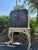 1920s 1920s Chinoiserie Black Lacquer & Gilt Cabinet on Painted Carved Stand For Sale - Image 5 of 7