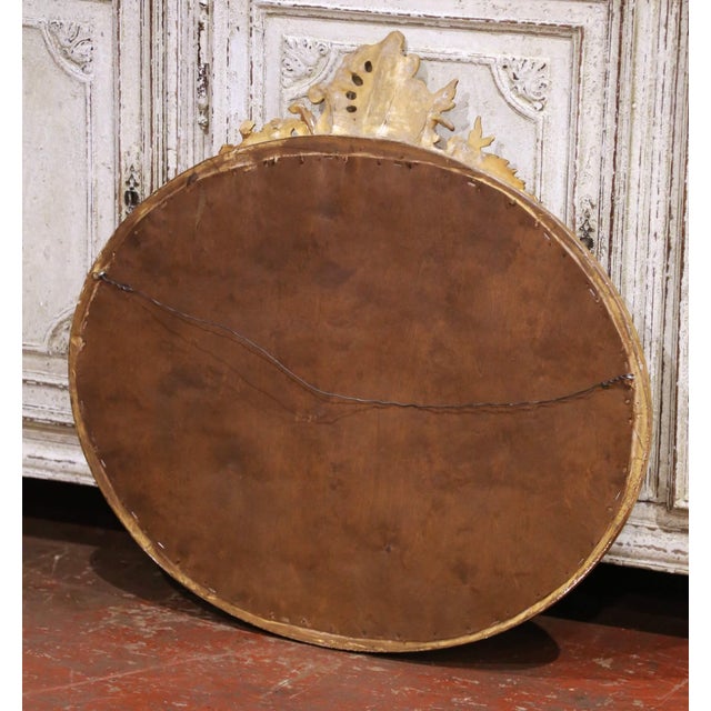 Wood 19th Century French Louis XV Oval Giltwood Wall Beveled Mirror With Crest For Sale - Image 7 of 7