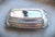 1940's English Hallmarked Vintage Silver Plated Repoussed Butter Dish with beautifully designed top and bottom. The piece...