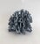 Natural Blue Coral specimen with cut and polished base to protect surfaces. Each piece is cleaned and trimmed from its...