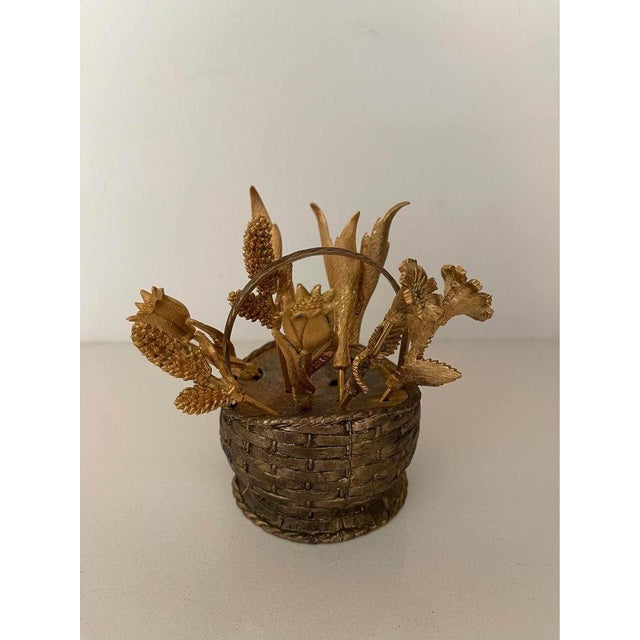 Function meets whimsical sophisticated. Add a bit of fun to any tea or cocktail party with these petit brass flower...