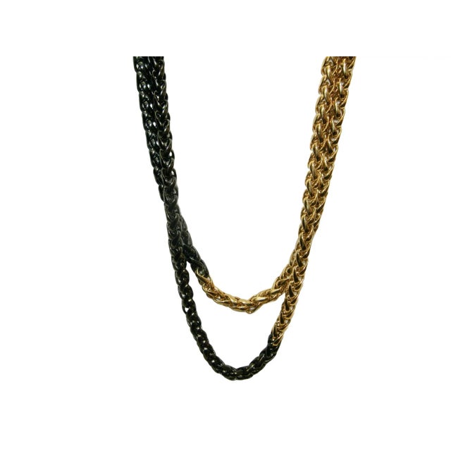 This is part of Chairish’s Costume Jewelry assortment. Gorgeous vintage Givenchy rare gold & hematite thick chain fold-...
