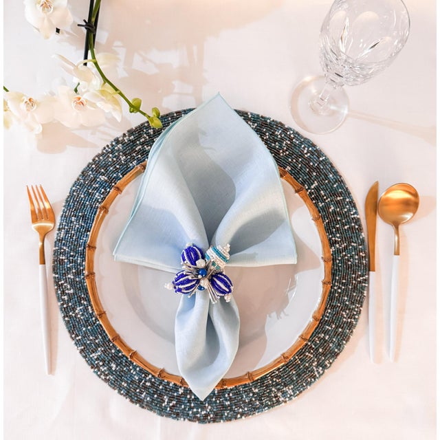 Elevate your table setting with our Blue Linen Napkins, a set of 4 handcrafted napkins designed to bring both...
