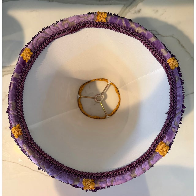Add a rich touch of vintage elegance to your lighting with this beautiful lamp shade featuring luxurious purple velvet...