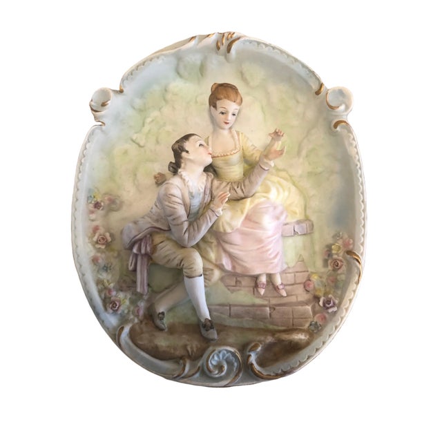 A pair of mid 20c bisque wall plaques. Very nice detail no damage possibly made by Arnart creations.