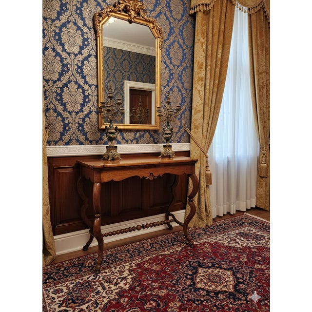 The piece features the typical characteristics of the Louis-Philippe style, popular around 1860, such as curved legs...