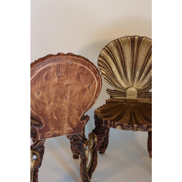 each with shell-form back and seat over pearl-seeded cabriole legs