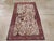 A vintage Persian Tabriz throw rug handmade during the Mid-20th century. Measures: 2' 8" x 4' 5"