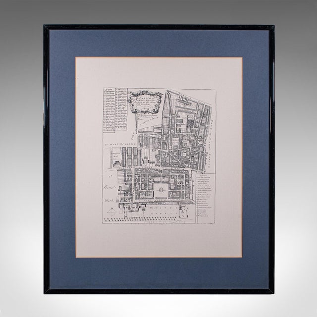 This is a vintage 18th century street map of London. An English, framed reproduction showing the parish of St James's...