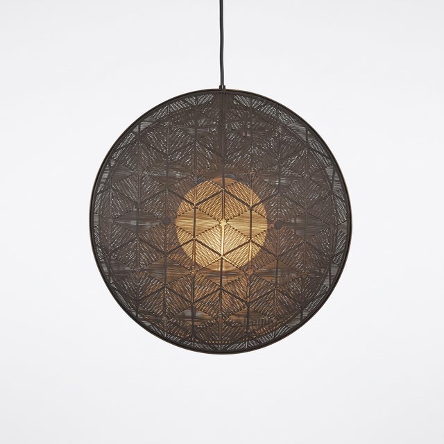 Handcrafted in the Philippines by Schema for Oggetti, the Hush Pendant Light showcases an exquisite balance of industrial...