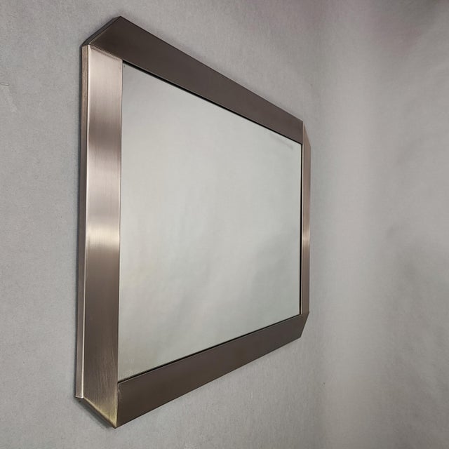 Valenti satin steel mirror, vintage 1970s. It can be mounted both vertically and horizontally. Design period: 1970-1979...