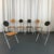 This rare set of six R.J.C. folding chairs by René-Jean Caillette represents the absolute pinnacle of French post-modern...