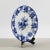 This wedgwood glazed ceramic plate is a vintage piece that expresses the classic aesthetic of english craftsmanship. Its...