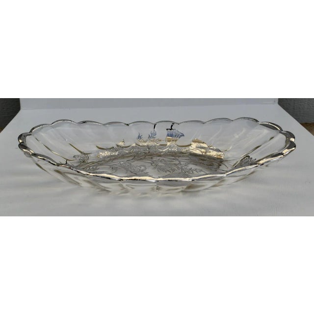 Vintage (1950's) Glass Dish has an Art Nouveau Style. The Dish has a Scalloped Edge with Floral Details in a SIlver...