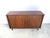 Attractive mid century cabinet with two sliding tambour doors. Beautiful teak wood, very well crafted tambour doors and 5...