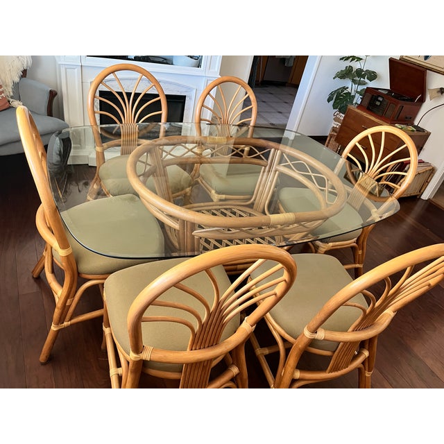Vintage rattan from King’s Rattan, dated September 2003. Wheat colored polyester seat fabric. Honey colored stain on the...