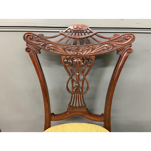 A very good late Victorian period mahogany salon suite. Comprising of a settee, a pair of armchairs and four side chairs....