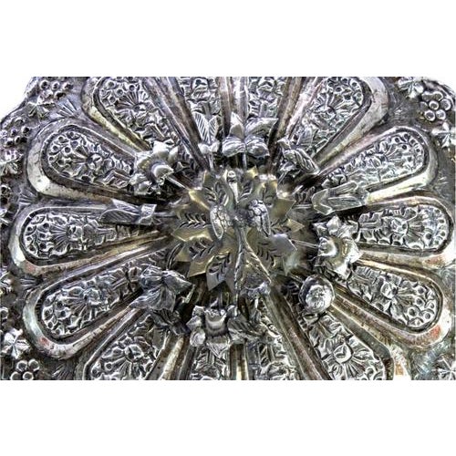 Silver Hand Mirror with Reliefs and Bird-Shaped Handle, in Very Good conditions. Designed from 2000 This piece has an...