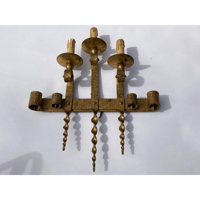 A rare large brutalist style gilt wrought iron wall sconce, Hollywood Regency. Quite honestly difficult to date. Brutalism...