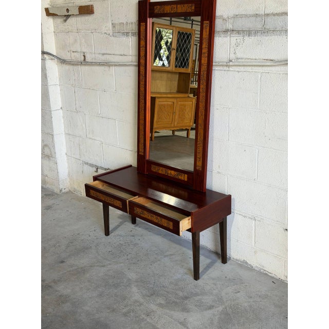 Beautiful vintage Danish modern entryway set in Style of Pedersen & Hansen, crafted in richly grained rosewood with...