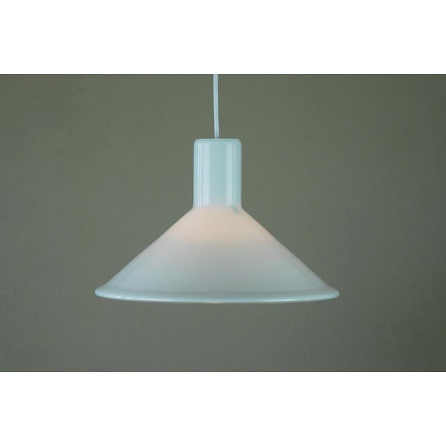 Inspiration from the old-fashioned office lamps. Originally in green, later added in opal, eggplant. Blue was available in...