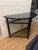 Black Lacquered Demi Lune Console with Base Stretchers Length: 45" Width: 21" Height: 33"