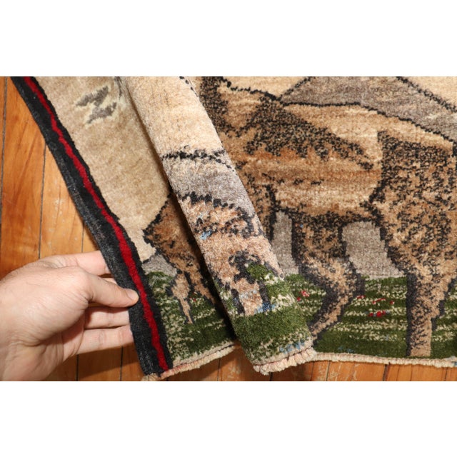 mid 20th-century turkish rug depicting a deer Details rug no. j3835 size 1' 5" x 1' 11" (43 x 58 cm)