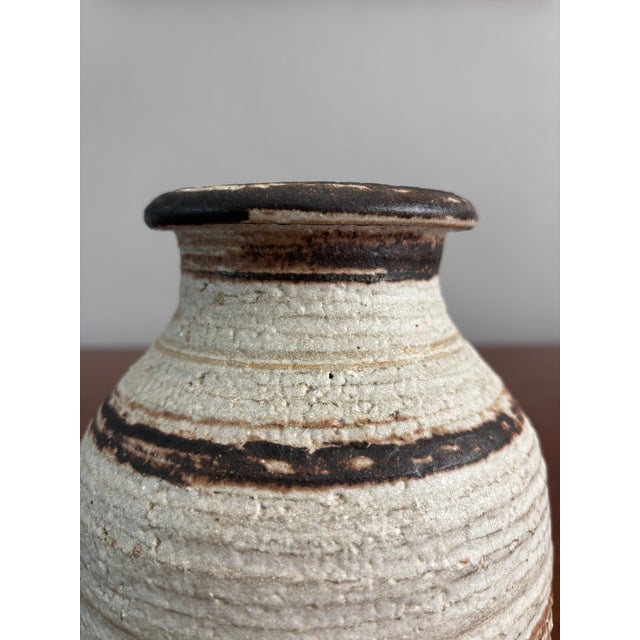 A refined mid-century ceramic vase produced by Bitossi for Rosenthal, made in Italy during the 1960s. This sculptural form...