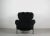 Pl19 also known as tre pezzi armchair with black enameled steel tube structure, upholstered in black mongolian goat wool....