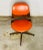 Mid Century Modern Dining Room Chair by George Mulhauser for Plycraft. The chair is made of walnut wood and orange vinyl....