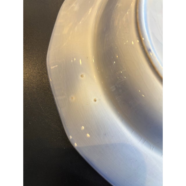 This is a beautiful flow blue bowl by Wedgwood in the Chapoo pattern. There are imperfections on the bowl that was part of...