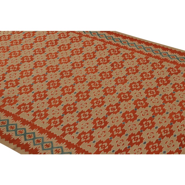 Hand woven in a wool flat weave originating from Turkey circa 1950-1960, this vintage Kilim rug is one of them most regal...