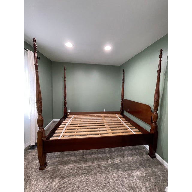 Beautiful traditional queen-size four-poster rice bed frame from the highly sought-after Mahogany Collection by...