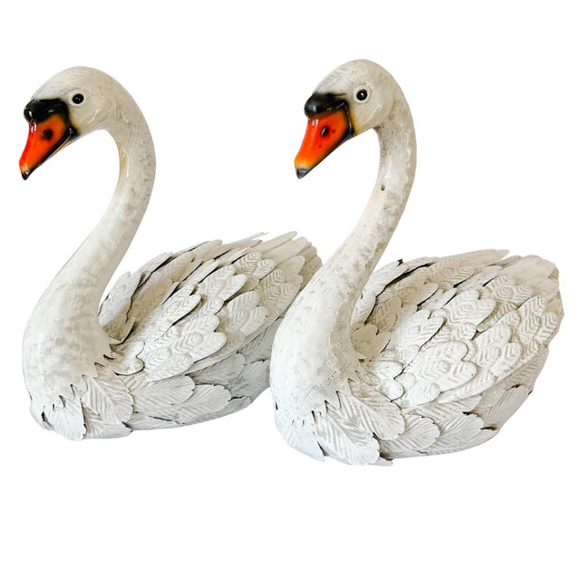 A graceful and whimsical pair of white distressed swan sculptures. Made from layered, die-cut sheet metal, each swan...
