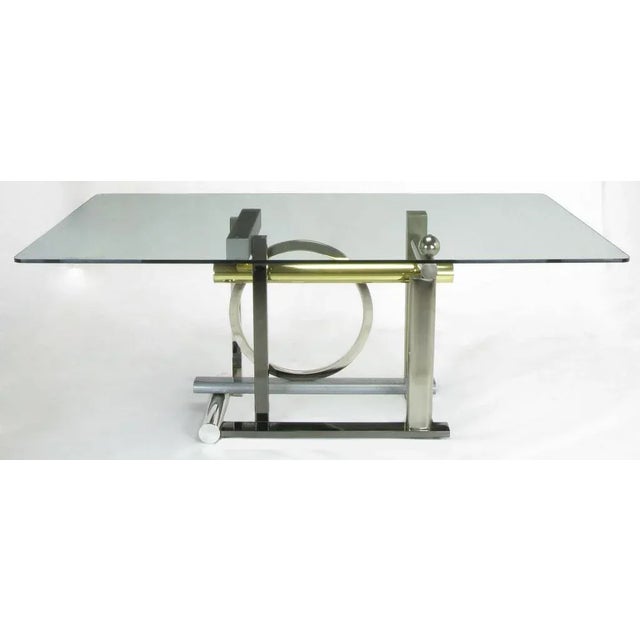 Design Institute of America post modern glass top dining table with geometric metal base designed by famed metal sculptor...