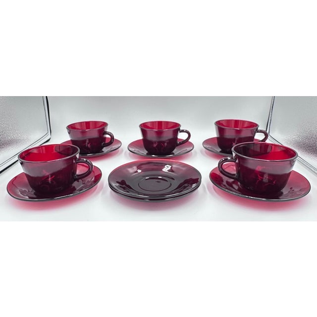 Elevate your coffee service with this delightful 12-piece set of Anchor Hocking dishes in the stunning Baltic Royal Ruby...